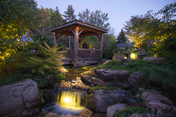 LED backlit waterfall, with surrounding pond lighting and large rock borders, Tapple Hill, North Carolina